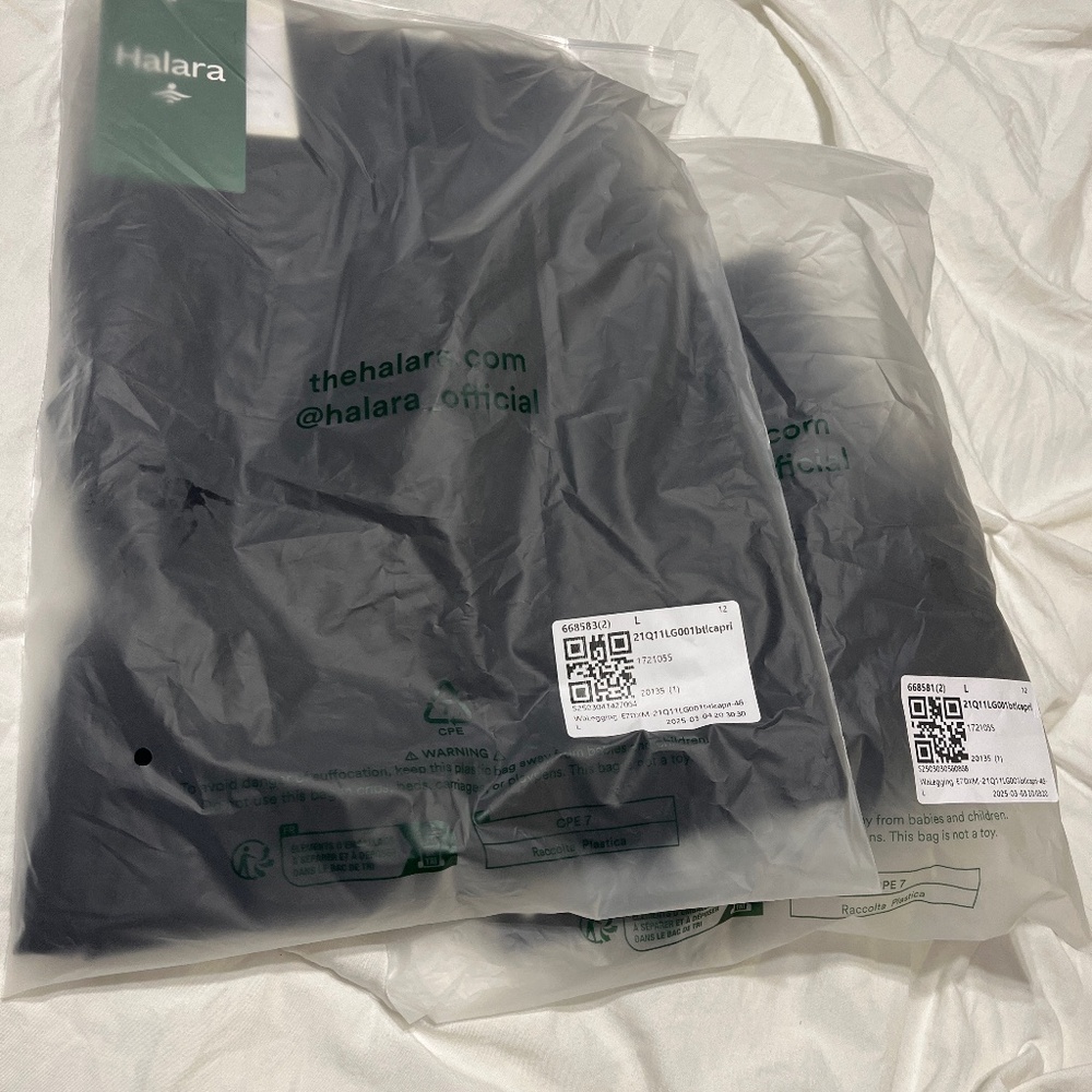 One pairs NWT Halara So Cinched Black Capris